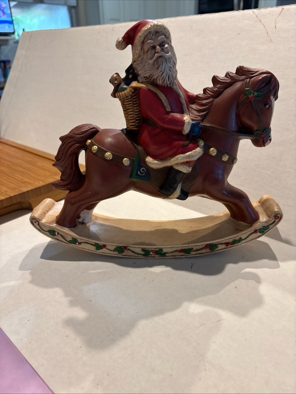 Vintage Santa on Rocking Horse Holiday Figurine - Red and Brown
